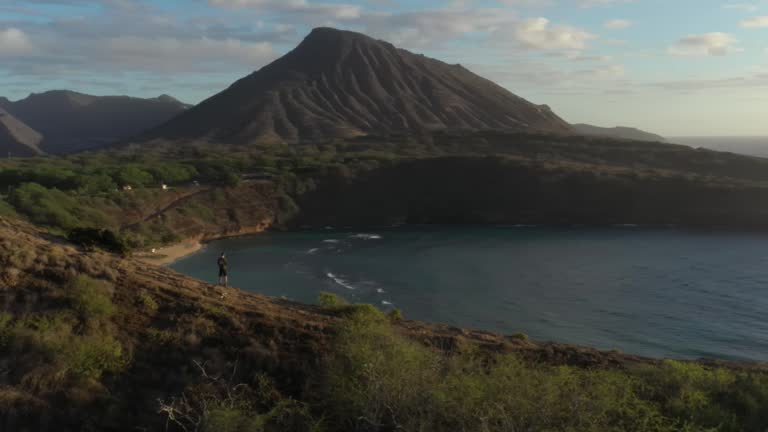 Aerial video of a man watching in Nauma Bay