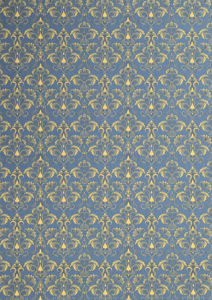 istock Old wallpaper on the wall. Old wallpaper for texture or background. 2114693735