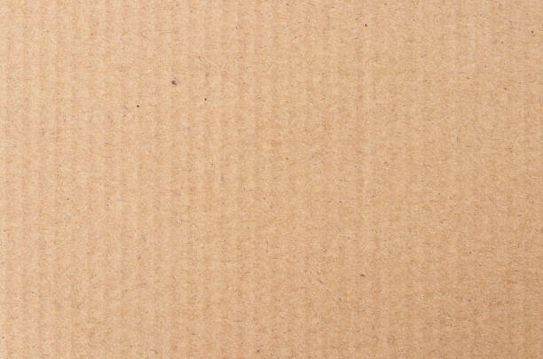 istock Brown cardboard sheet abstract background, texture of recycle paper box in old vintage pattern for design art work. 2114703620