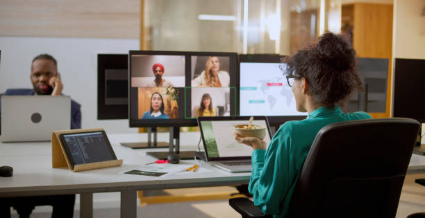 istock Woman having online meeting with team 2114723383