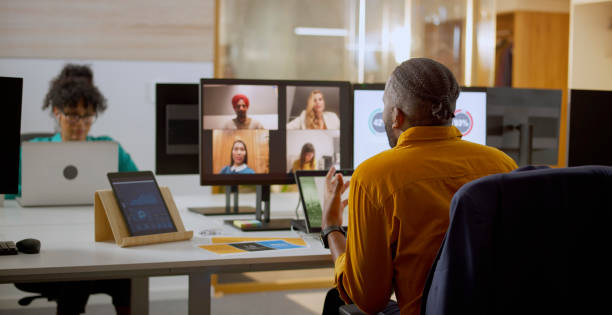 istock Man having online meeting with team 2114723389