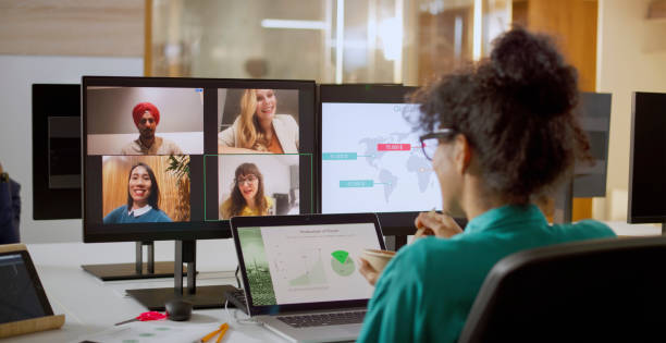istock Woman having online meeting with team 2114723401
