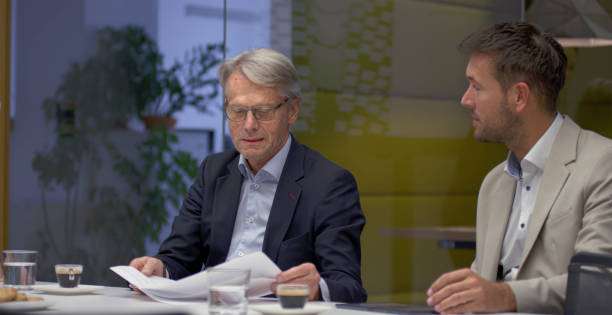 istock Business colleagues having meeting in office 2114723424