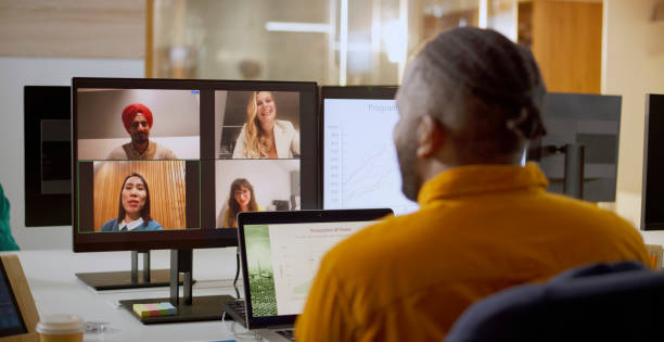 istock Man having online meeting with team 2114723445