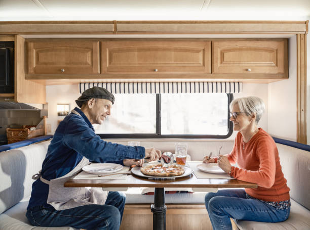 istock Senior Couple enjoying RV trip adventure 2114732342