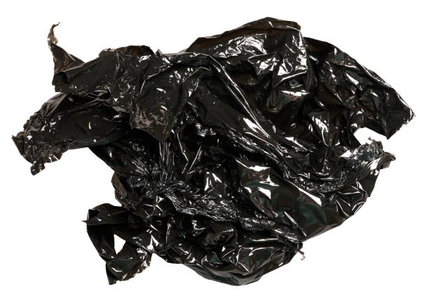 istock Crumpled piece of black polyethylene on isolated background 2114735018