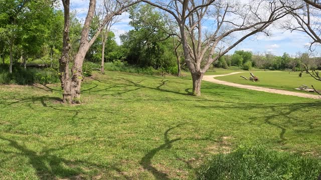A walking path through a campground and public nature area near San Antonio Texas