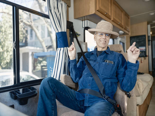 istock Senior man enjoying RV trip adventure 2114750688