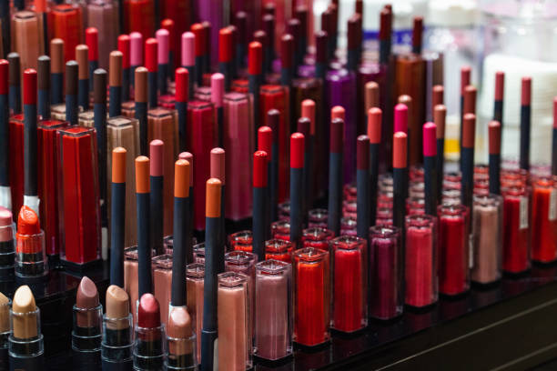 istock Set of lipsticks in a cosmetics store. 2114752271