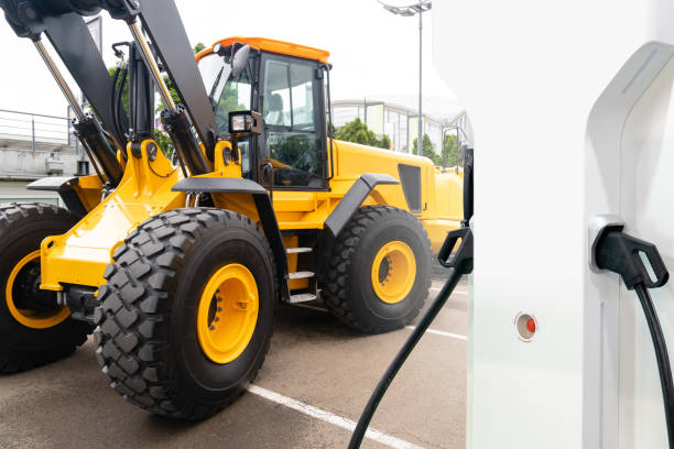 istock Electric construction machines with charging station. 2114771145