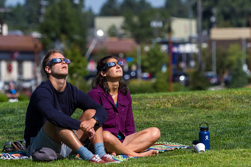 Coeur d' Alene, Idaho - August 21 : Couple enjoying the eclipse together. August 21 2017, Coeur d' Alene Idaho.