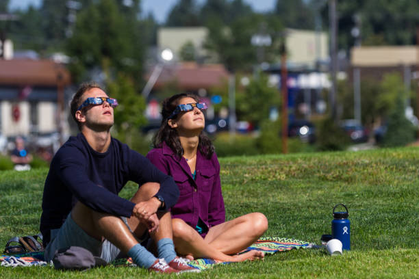 watching the eclipse stock photo
