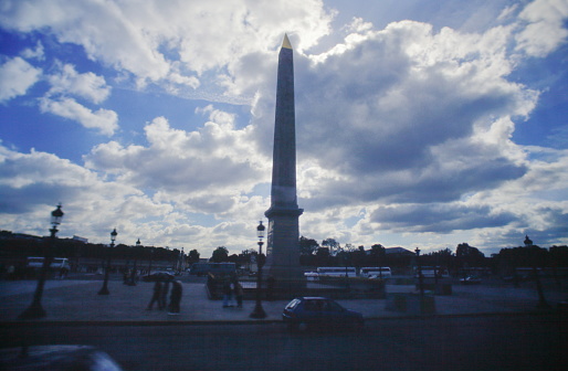 View of the giant Egyptian obelisk decorated with hieroglyphics at the centre of the Place de la Concorde, Paris during early 1990s