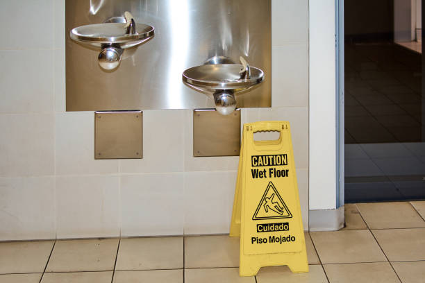 istock Wet floor sign in public space 2114808301
