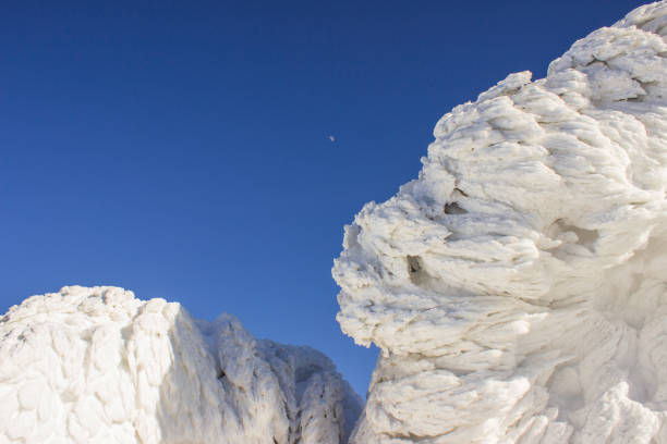 The Hermanitos peaks covered in snow in winter in the Sierra de Béjar