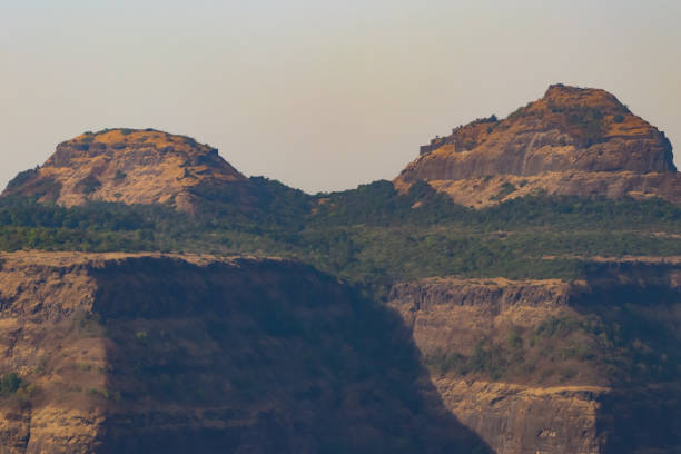 Two Big Mountain Top With Green Small Trees