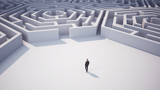 3d Render Businessman heading towards Hexagon shaped maze. Business and Finance Concept (Depth of Field)