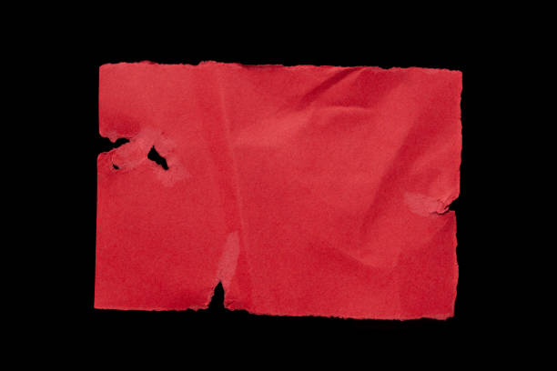 istock Red ripped paper with isolated on black background 2114877742