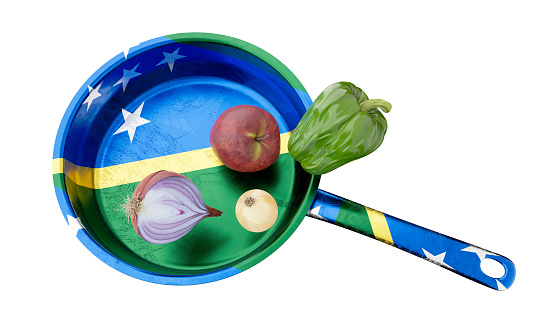 Striking image of a skillet with the Solomon Islands flag, ready for a healthy meal with apple, onion, and bell pepper.