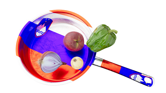 A vivid photo of a pan showcasing Slovenia's coat of arms, with a red apple, purple onion, and green bell pepper.