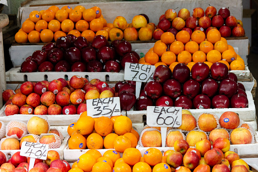 Nectarines, plums, peaches and green and red grapes at an Italian market stall. Fresh, tasty and very healthy fruits