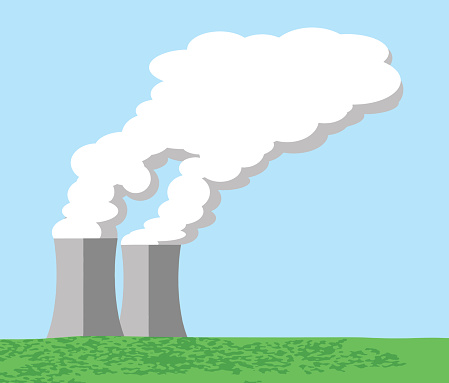 Cooling towers emit clouds of steam into the sky, with copy space.