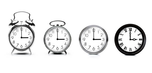 istock Various alarm clocks and clocks with three o'clock 2114944890