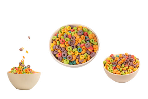 istock Colorful rings cereal spill out into a bowl. Breakfast. Isolated. 2114954495