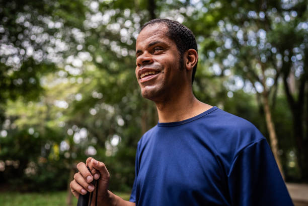 istock Visually impaired man walking on a public park 2114955045