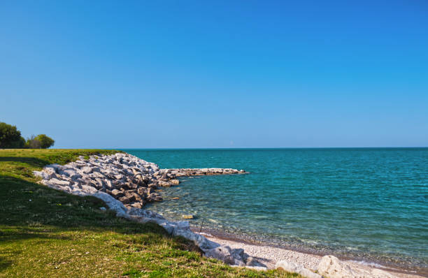 Beautiful teal Huron Lake , thanks to the salt lines underwater - Goderich, ON, Canada