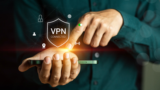 VPN Virtual private network concept. Internet security, encrypted connection for anonymous internet user. Person use smartphone with VPN connection on virtual screen. VPN concept.