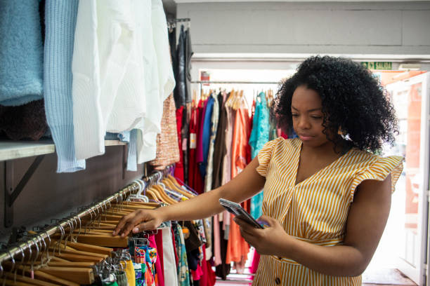 istock Woman clothing store owner 2115063859