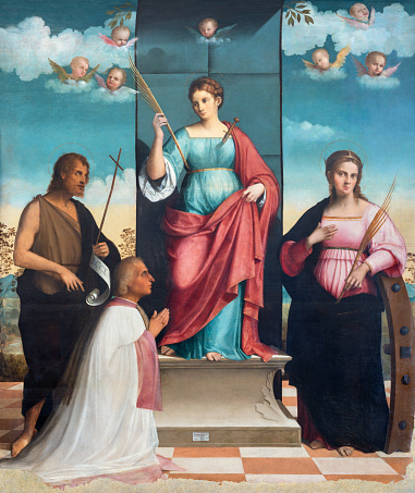 Treviso - The painting of St. Justina, St. Catherine of Alexandria and St. John the Baptist in the church La Cattedrale di San Pietro Apostolo by Francesco Bisollo (1530).