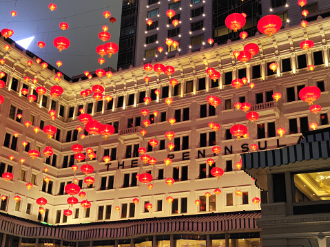 Scenic chinese lanterns hanging at the Peninsula Hong Kong, in Tsim Sha Tsui, Kowloon, Hong Kong, the flagship property of The Peninsula Hotels group. The hotel opened in 1928, and was the first under The Peninsula brand. It combines colonial and modern elements.