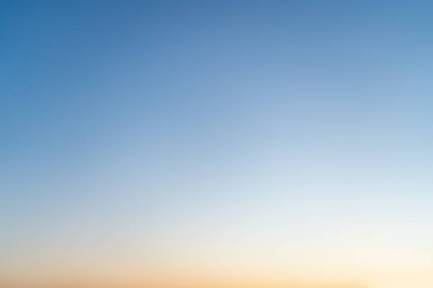 istock Calm gradient sky from warm twilight to peaceful night blue 2115092699