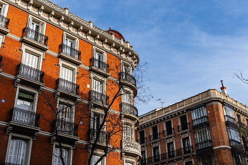 Madrid, Spain - 17 March, 2024: Old Luxury Residential Buildings with Balconies in Jeronimos Quarter in Retiro District