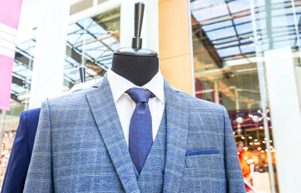 istock Male mannequin dressed in elegant suit with a tie 2115140294