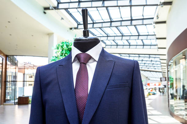 istock Male mannequin dressed in elegant suit with a tie 2115140297