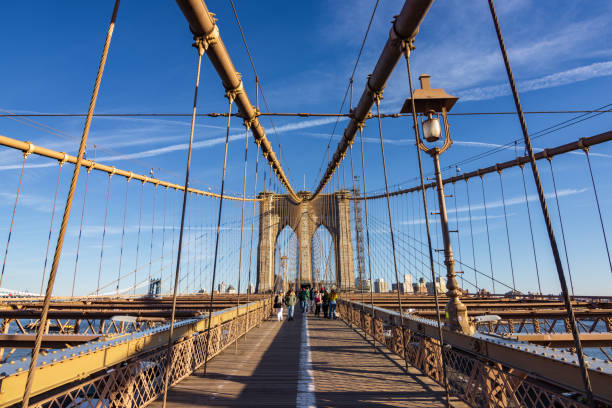 istock Sunset in Brooklyn bridge in New York City (USA) 2115147716