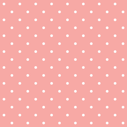 Pastel pink and white seamless polka dot pattern vector