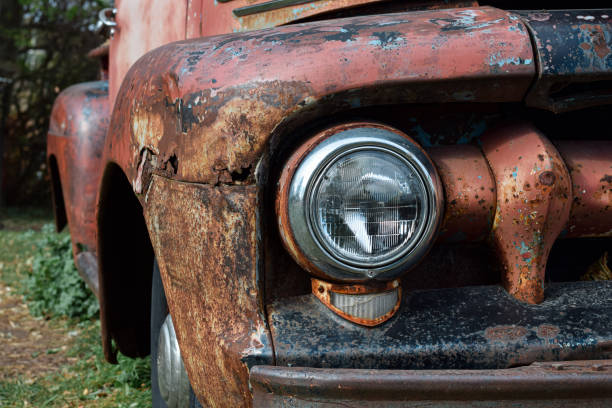 istock Very old rusty abandoned car with corroded metal exterior 2115217073