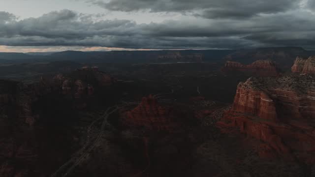Red Sandstone Formations At Grand Canyon National Park With Overcast At Sunset In Arizona, USA. aerial shot. Bell Rock.