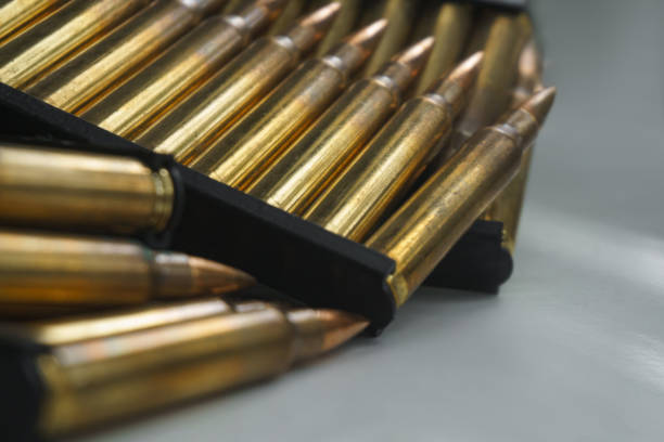 istock Close-up of ammunition for an assault rifle. 2115254461