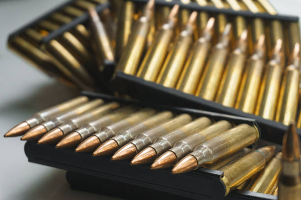 istock Close-up of ammunition for an assault rifle. 2115270317
