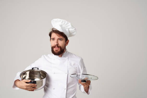 istock professional chef with a pot in his hands kitchen service profession 2115275935