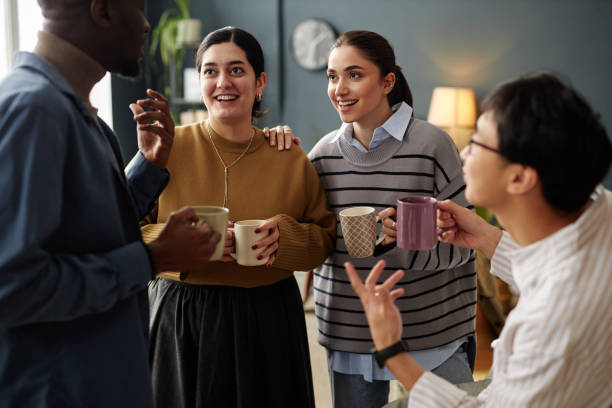 istock Diverse Group of Colleagues Chatting 2115291587