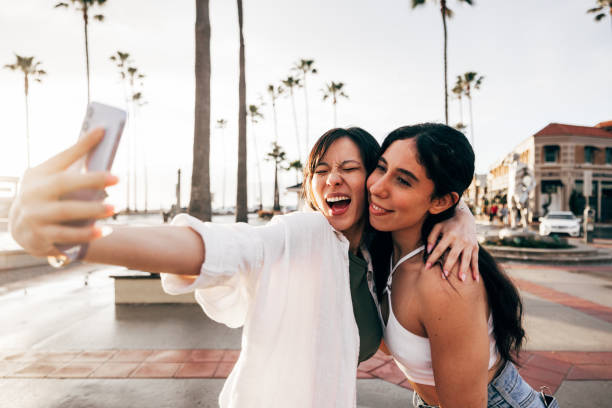 istock Happy women on summer vacation and shoot a selfie 2115296312