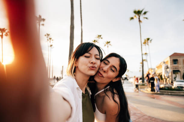 istock Happy women on summer vacation and shoot a selfie 2115296869
