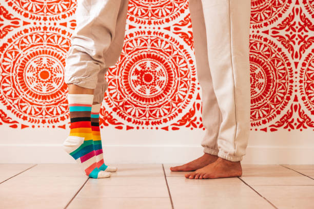 Person wearing rainbow socks during the Pride Month in the United States.