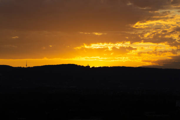 beautiful orange sunset in the evening at dusk, foreground black